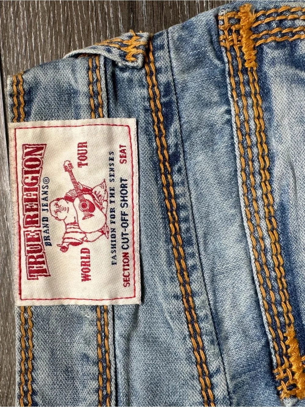 True Religion Light Wash Denim Shorts with Orange Topstitching